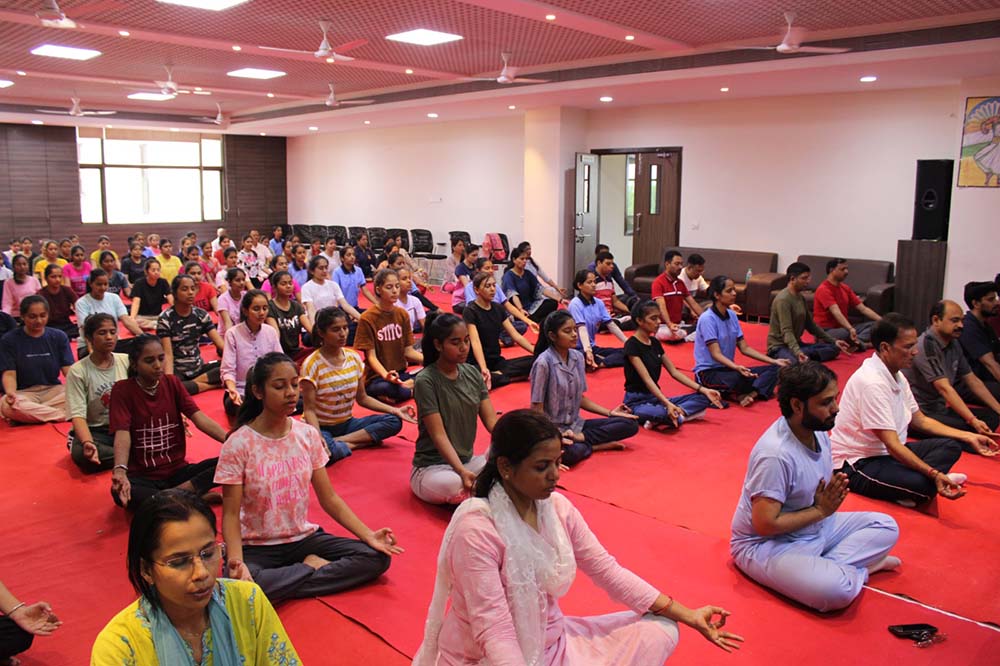 Report on International Yoga Day - RK Girls Nursing College
